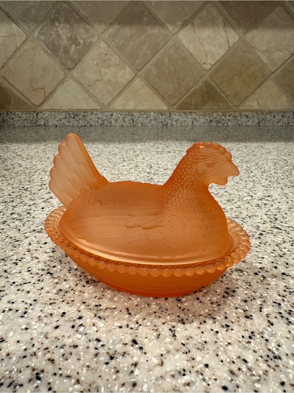 Vintage peach glass hen on nest